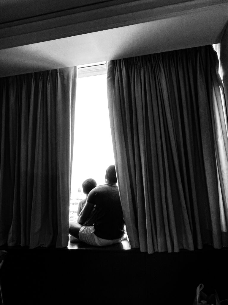 Father and Child by the Window